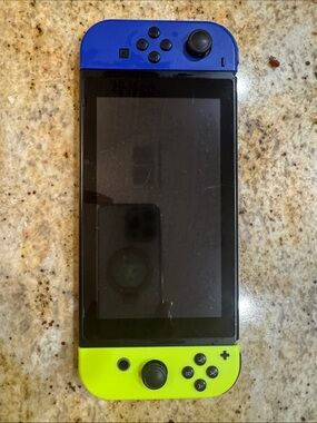 Nintendo Switch with Neon Yellow and Royal Blue Joy-Con Covers 32gb